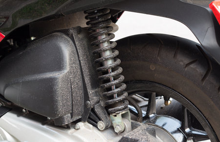 Close up shock absorber, Race car dirty mud shock of motorcycleの写真素材