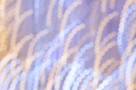 Blurred image of festive lights that can be used as backgroundの写真素材