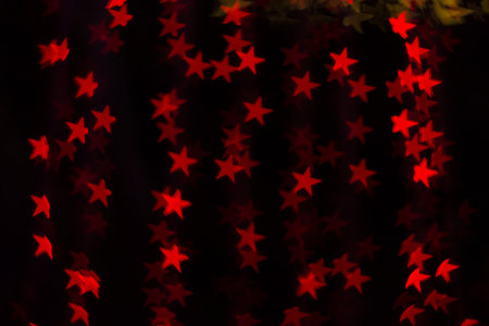 Blurred image of festive lights that can be used as backgroundの写真素材