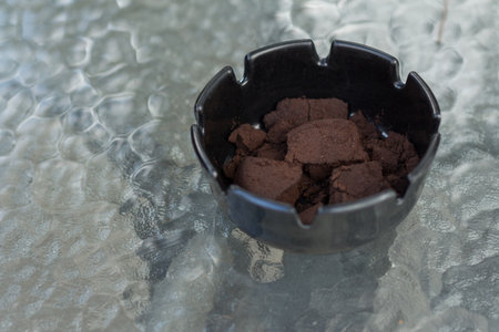 ashtray on the glass tableの写真素材