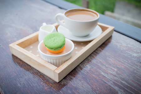 hot coffee breakfast set with fresh macaroonの写真素材