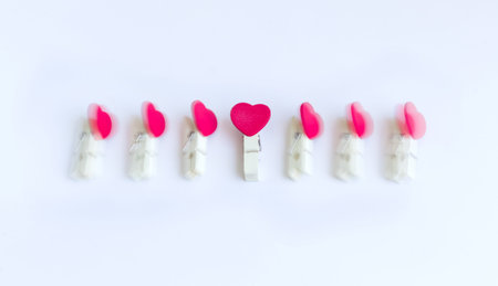 wooden clothes pin or cloth pegs with heart shape design(zooming technique)