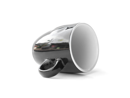 Black coffee cup with simple design isolated on white backgroundの写真素材