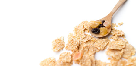 whole grain cereal flakes which mixed berry fruit and raisins for breakfast isolaed on white...