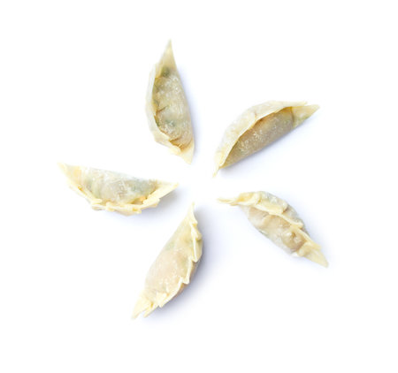 Picture of raw dumplings or gyoza isolated on white backgroundの写真素材