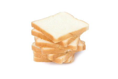 picture of sliced soft and sticky delicious white bread for breakfast on white isolated backgroundの写真素材