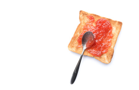 homemade slide bread with strawberry jam isolated on white backgroundの写真素材