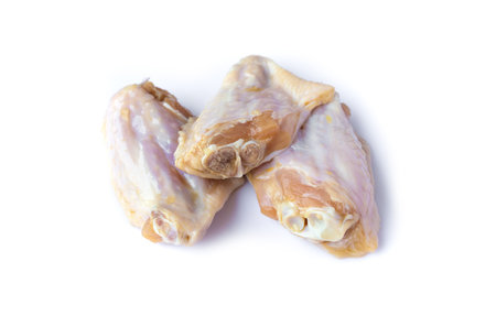 The picture of raw chicken wings isolated on white backgroundの写真素材