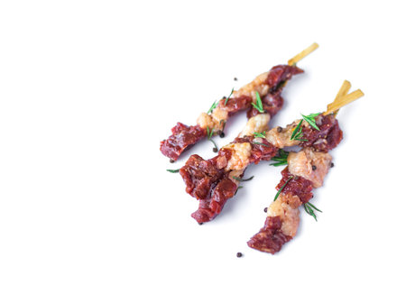 fresh raw beef meat with rosemary and pepper isolated on white. Food meat preparation cooking conceptの写真素材