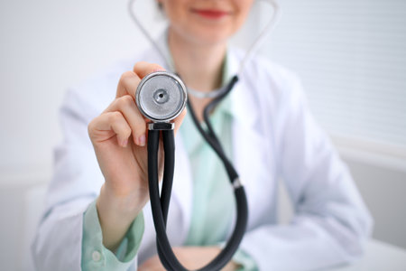 Doctor with a stethoscope in the handsの写真素材