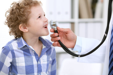 Doctor examining a child  patient by stethoscope