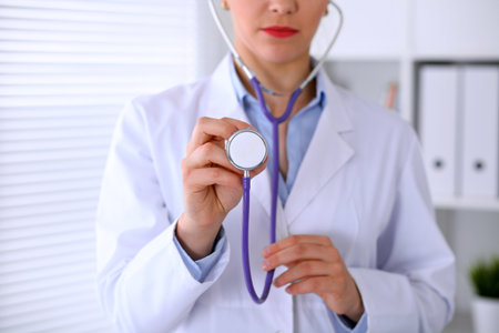 Doctor with a stethoscope in the handsの写真素材