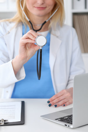 Doctor with a stethoscope in the handsの写真素材