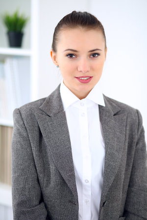 Young business woman in office. Successful business concept.の写真素材