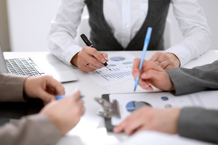 Group of business people at the meeting discussing financial results.の写真素材