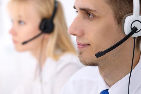 Young business man in headset. Call centerの写真素材