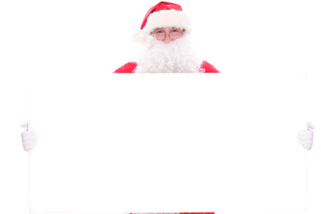 Kind Santa Claus holding copy space area, isolated on white background.の写真素材
