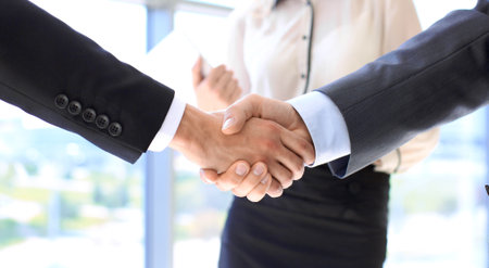 Business people shaking hands as a sign of agreement. Success conceptの写真素材