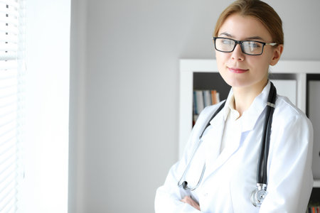 Doctor woman at work. Portrait of female physician at hospital office. Medicine and healthcare conceptの写真素材