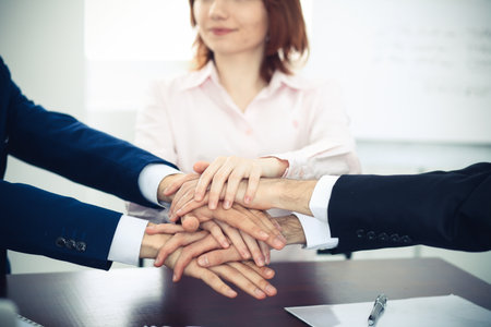 Business people group joining hands. Teamwork or meeting conceptsの写真素材