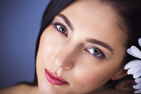 Portrait of smiling brunette woman looking at camera. Beauty conceptの写真素材