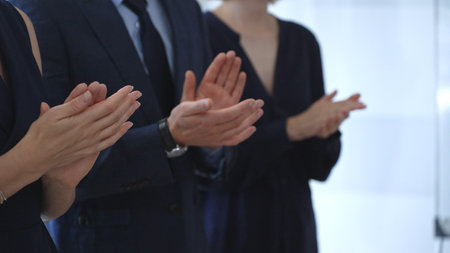 Business audience hands clapping, showing appreciation and success in a corporate meeting,...
