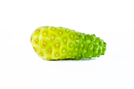Noni fruits on white isolated background の写真素材
