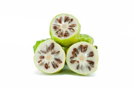 Noni fruits on white isolated background の写真素材