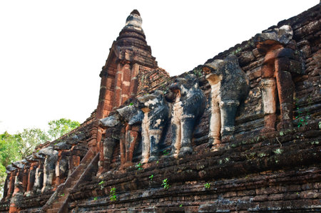 elephant statue around pagoda at temple   Wat Chang Lom  , Kamphaeng Phet, Thailand の写真素材
