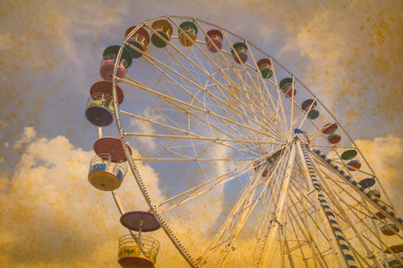 Ferris wheel processed in old style の写真素材