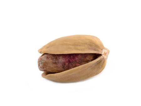 Single pistachio on white backgroundの写真素材