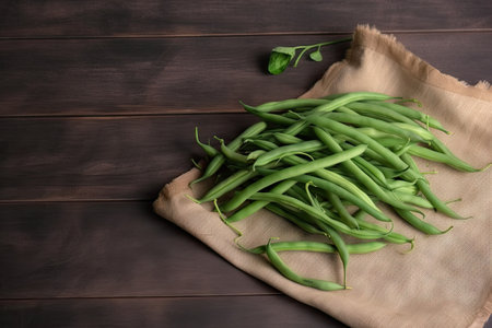 Green string beans on a textured background, empty space for text, vegetablesの素材