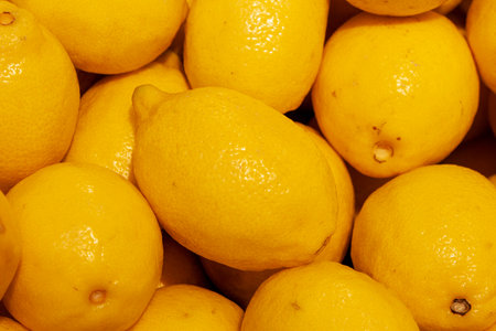 Colorful Display Of Lemons In Market.の写真素材