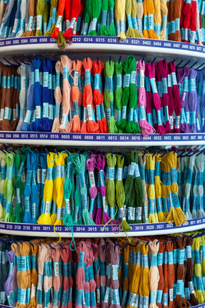 TOLYATTI, RUSSIA, JUNE 09, 2018: Rocks with colorful mouline in store. Color mouline threads. Palette of mulina threads for embroidery cross and smooth. Front view.のeditorial素材