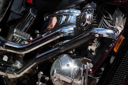 TOLYATTI, RUSSIA, JUNE 25, 2005: motorcycle show of bikers. Shiny chrome motorcycle engine block Chopper.のeditorial素材