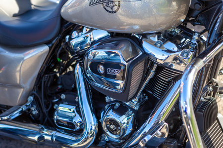 TOLYATTI, RUSSIA, MAY 09, 2018: show of bikers dedicated to Victory Day. Shiny chrome motorcycle engine block Yamaha, Honda. Reflection of people in a chrome plated surface.のeditorial素材