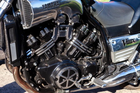 TOLYATTI, RUSSIA, MAY 09, 2018: show of bikers dedicated to Victory Day. Shiny chrome motorcycle engine block Yamaha, Honda. Reflection of people in a chrome plated surface.のeditorial素材