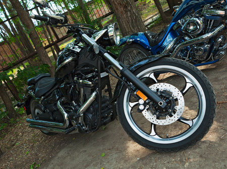 TOLYATTI, RUSSIA, JULY 03, 2010: biker show. Motorcycle chopper. Blue motorcycle hand assembly.のeditorial素材