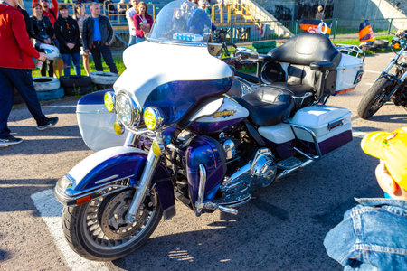 TOLYATTI, RUSSIA, MAY 09, 2018: Biker show dedicated to Victory Day. Harley Davidson motorbike. White and blue motorcycle with windshield.のeditorial素材
