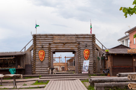 Sviyazhsk, Russia, June 04, 2018: Complex of historical reconstruction "Lazy Torzhok". Wooden gates and a fence. Bench with dried fish. Atmosphere of the medieval town of Sviyazhsk.のeditorial素材