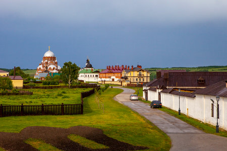 Sviyazhsk, Russia, June 04, 2018: Street leading to Cathedral in the name of the icon of the Mother of God. Gray domes, golden crosses.のeditorial素材