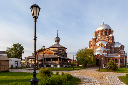 Sviyazhsk, Russia, June 04, 2018: Cathedral in the name of the icon of the Mother of God. Wooden temple on the island of Sviyazhsk. Gray domes, golden crosses.のeditorial素材