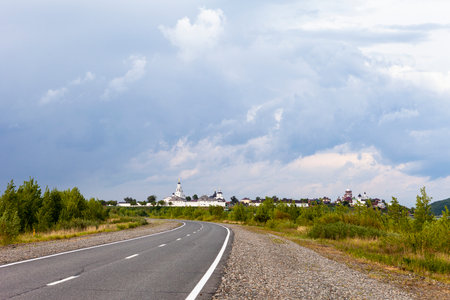 The road leading to the temple. Fluffy clouds against the blue sky.のeditorial素材