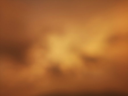 Brown yellow gold blurred abstract wallpaper backgroundの写真素材