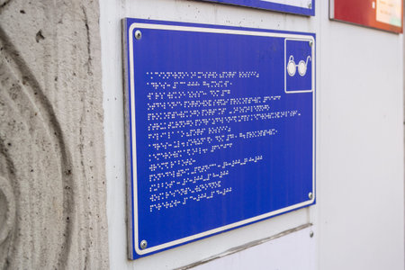A sign for the blind at the entrance to the organization,