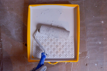 a computer repairman disassembles, repairs and does preventive maintenance for a broken laptop.の写真素材