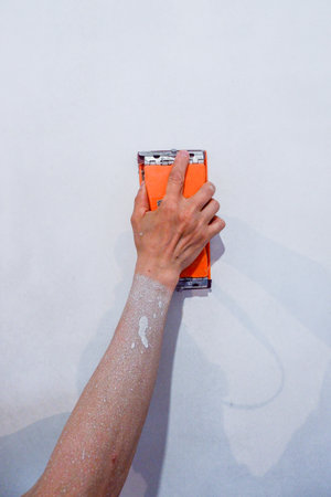 a computer repairman disassembles, repairs and does preventive maintenance for a broken laptop.の写真素材