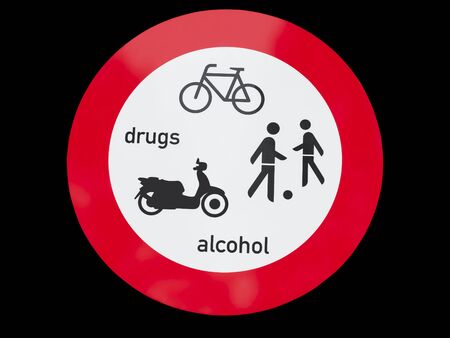 Warning street sign prohibiting using drugs, alcohol, playing football, bikingの写真素材
