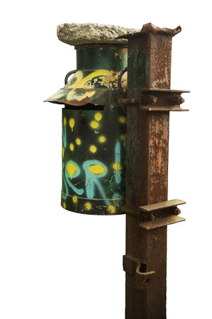 Iron old rusty postbox made from a milk can on a white backgroundの写真素材