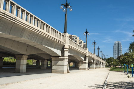 Valencia, Spain. One of the many bridges across old river bed of Turia, turned into famous and beautiful Turia park .の写真素材